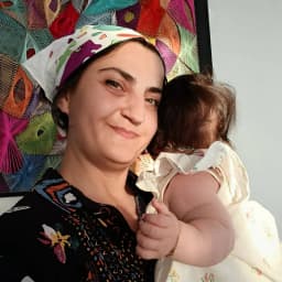 Hanife A. .
